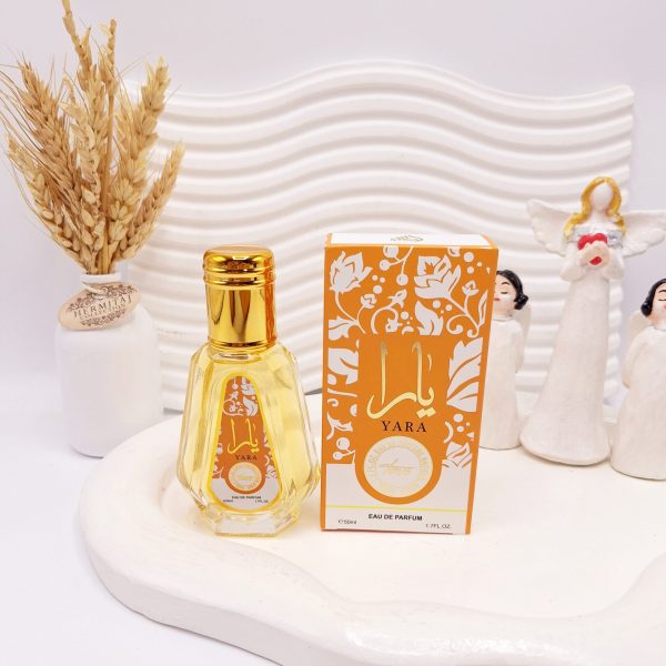 تصویر ادکلن زنانه یارا کارتن نارنجی 50 میل با رایحه وانیلی
